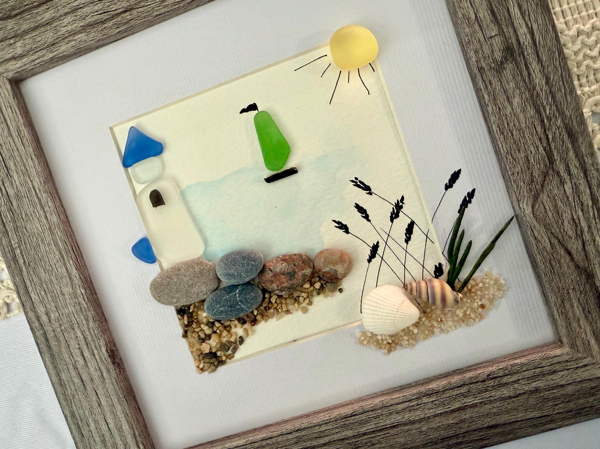 Sea Glass Pebble Art: Coastal Lighthouse & Sailboat Artwork